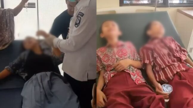Petugas medis merawat pelajar yang diduga keracunan makanan di Puskesmas Angata, Konawe Selatan.